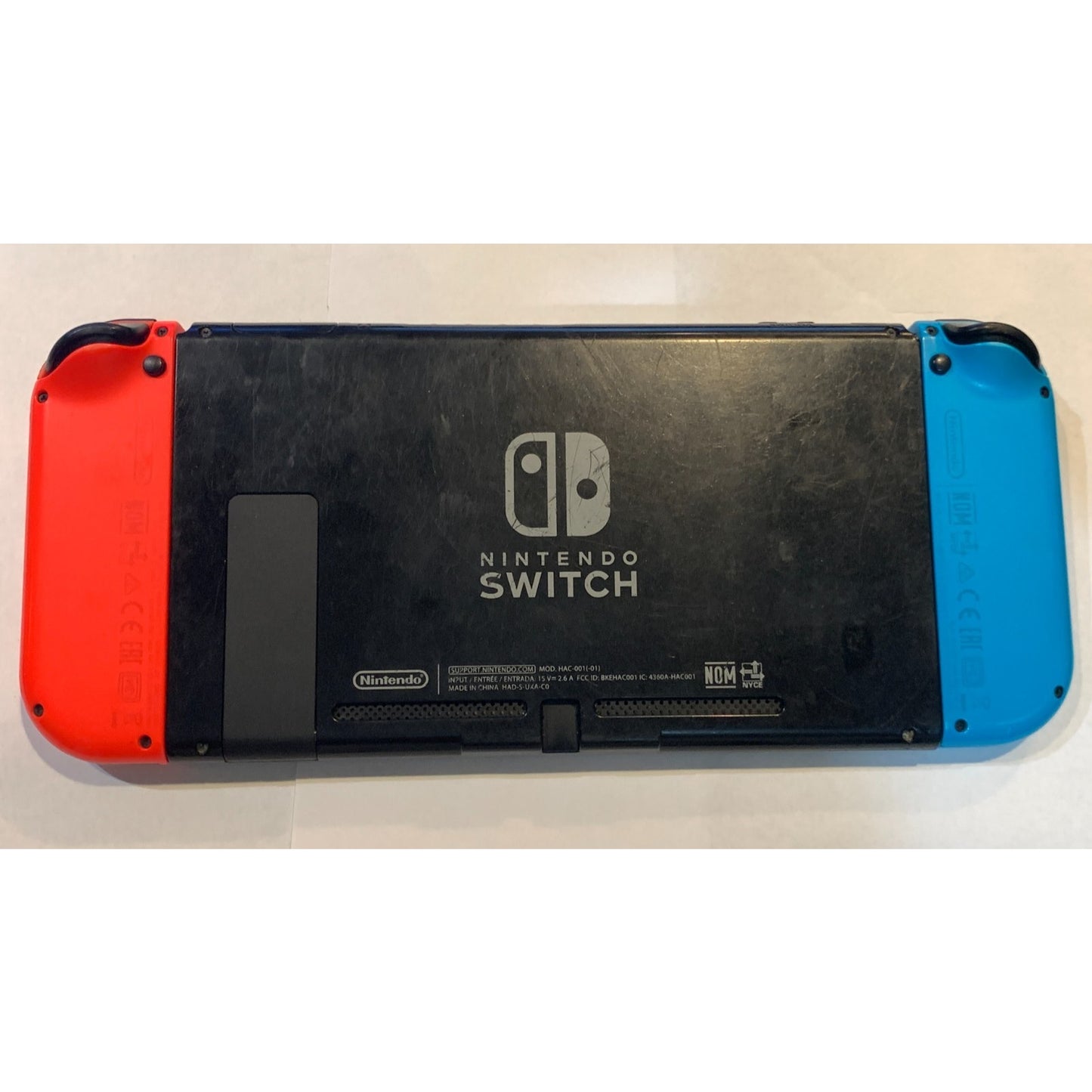 Nintendo Switch 32GB Handheld Console w/ Red & Blue Joycon