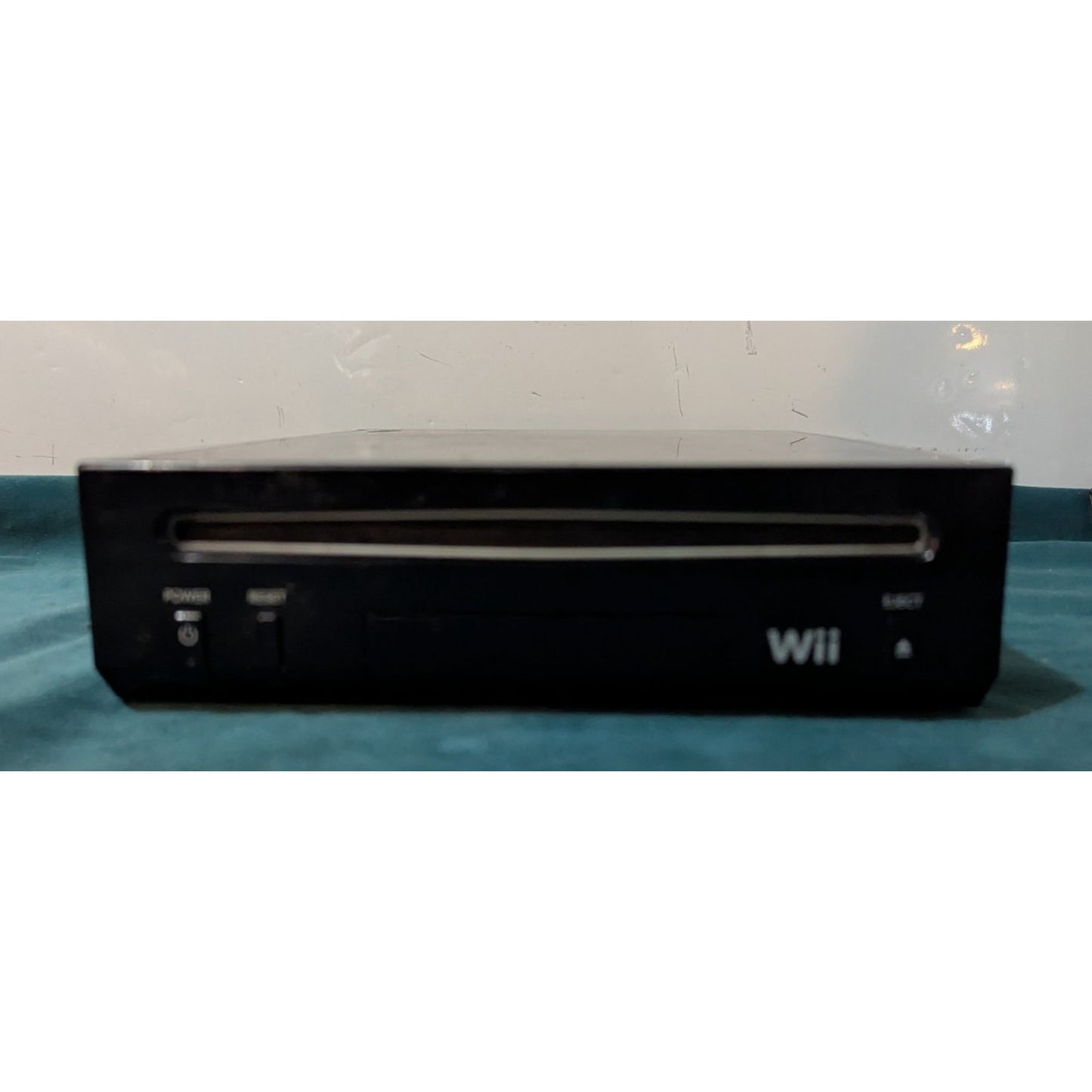 Nintendo Wii Black Video Game Console with Wires and Controller.