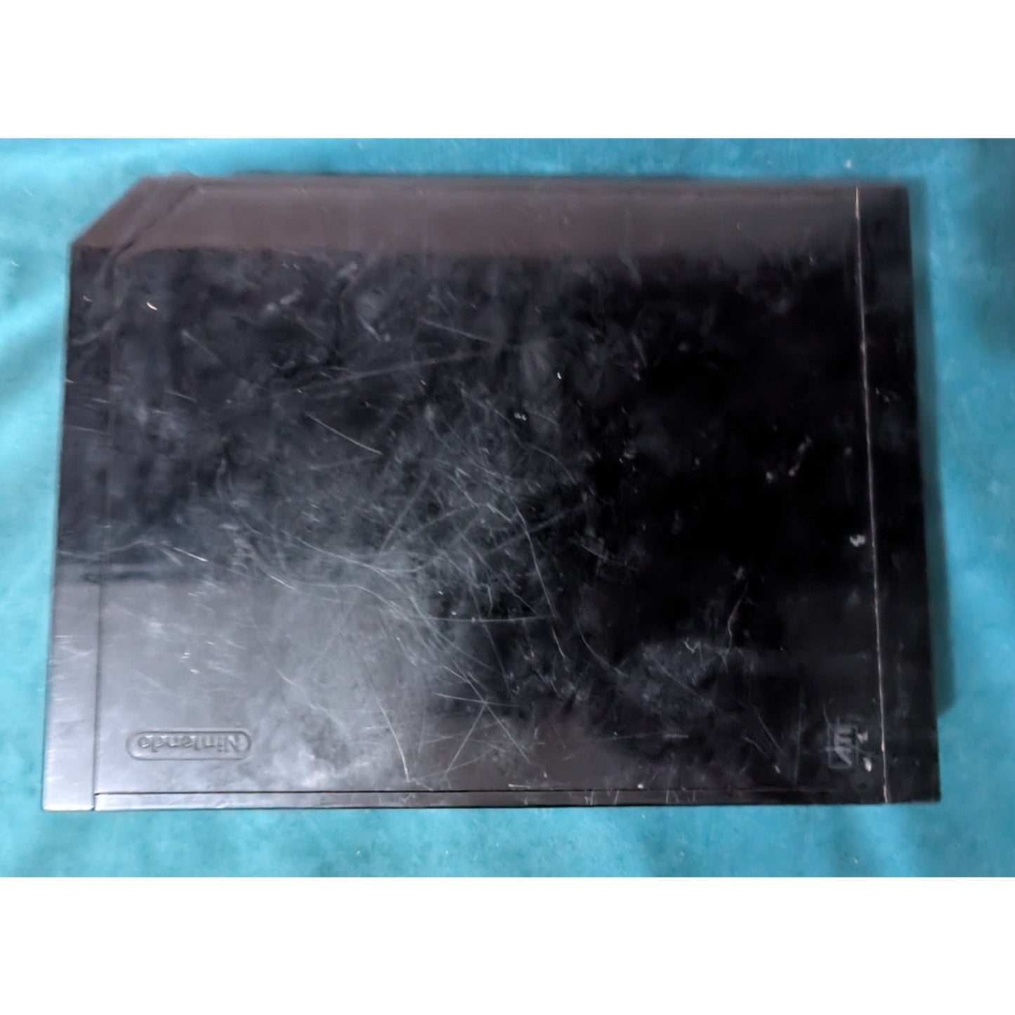 Nintendo Wii Black Video Game Console with Wires and Controller.