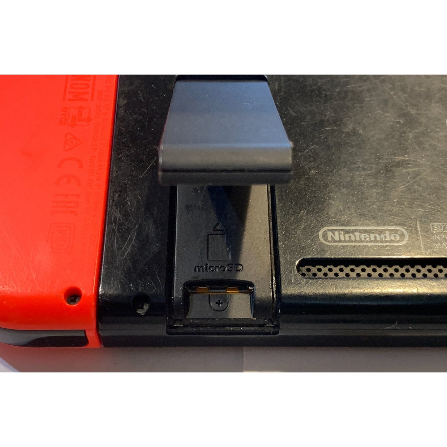 Nintendo Switch 32GB Handheld Console w/ Red & Blue Joycon